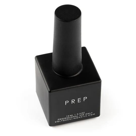 Small black bottle of Ugly Duckling PREP 15ml prep solution, shown from the back with product label visible.