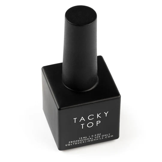 Ugly Duckling Tacky Top gel in a small black bottle, shown from the back with a sleek, cylindrical design.
