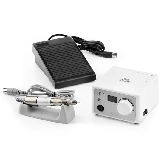 Ugly Duckling desktop e-file with ergonomic design and digital interface for efficient nail filing and shaping.