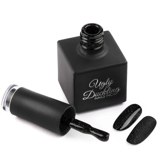 Ugly Duckling Paparazzi Gel Polish #087 with glossy finish, showing a vibrant, rich color in a close-up of the gel polish bottle.