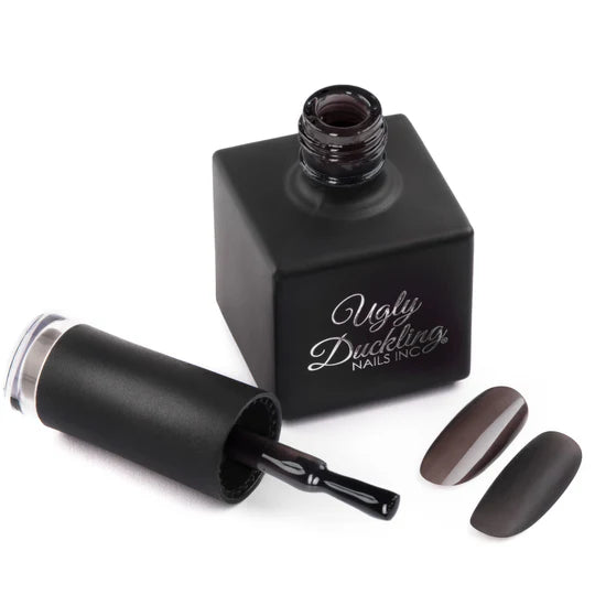 Ugly Duckling Licorice gel polish #220 in a sleek container, showcasing the deep black color and glossy finish of the gel polish.