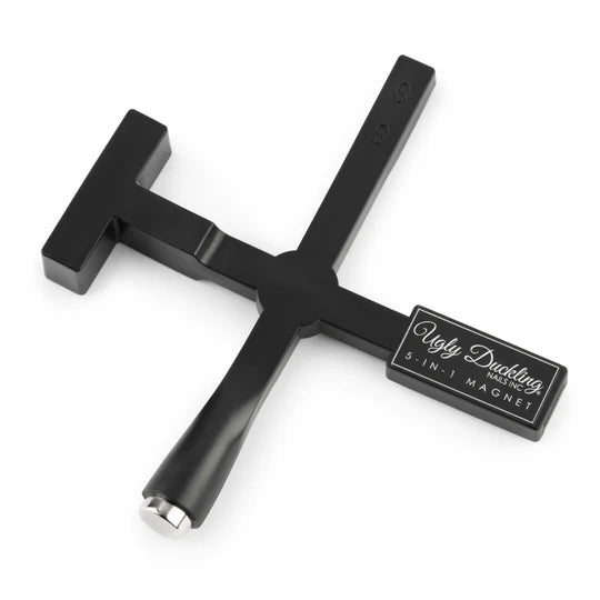 Ugly Duckling 5-in-1 Nail Art Magnet showing colorful magnetic nail designs on a black background.