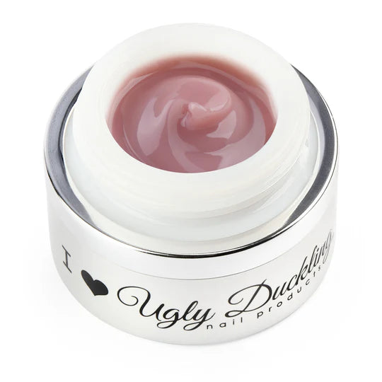 Ugly Duckling FAIR-Y FUFU Sculpting Gel builder gel for nail sculpting, shown in a clear container with a smooth gel texture.