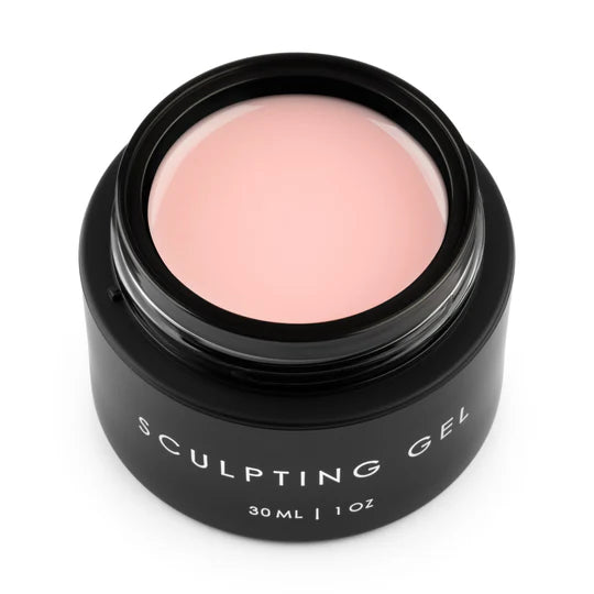 Ugly Duckling Milky Peach Sculpting Gel in a 30ml jar, showing the creamy peach-colored builder gel for nail sculpting and enhancement.